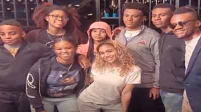Xavier Simmons with his siblings